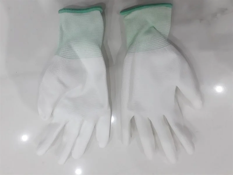 Găng tay phủ PU bàn trắng 2 53f3833d402245ca9d4e6e7257657afe